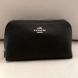 Coach cosmetic bag.  A gift that was never used.